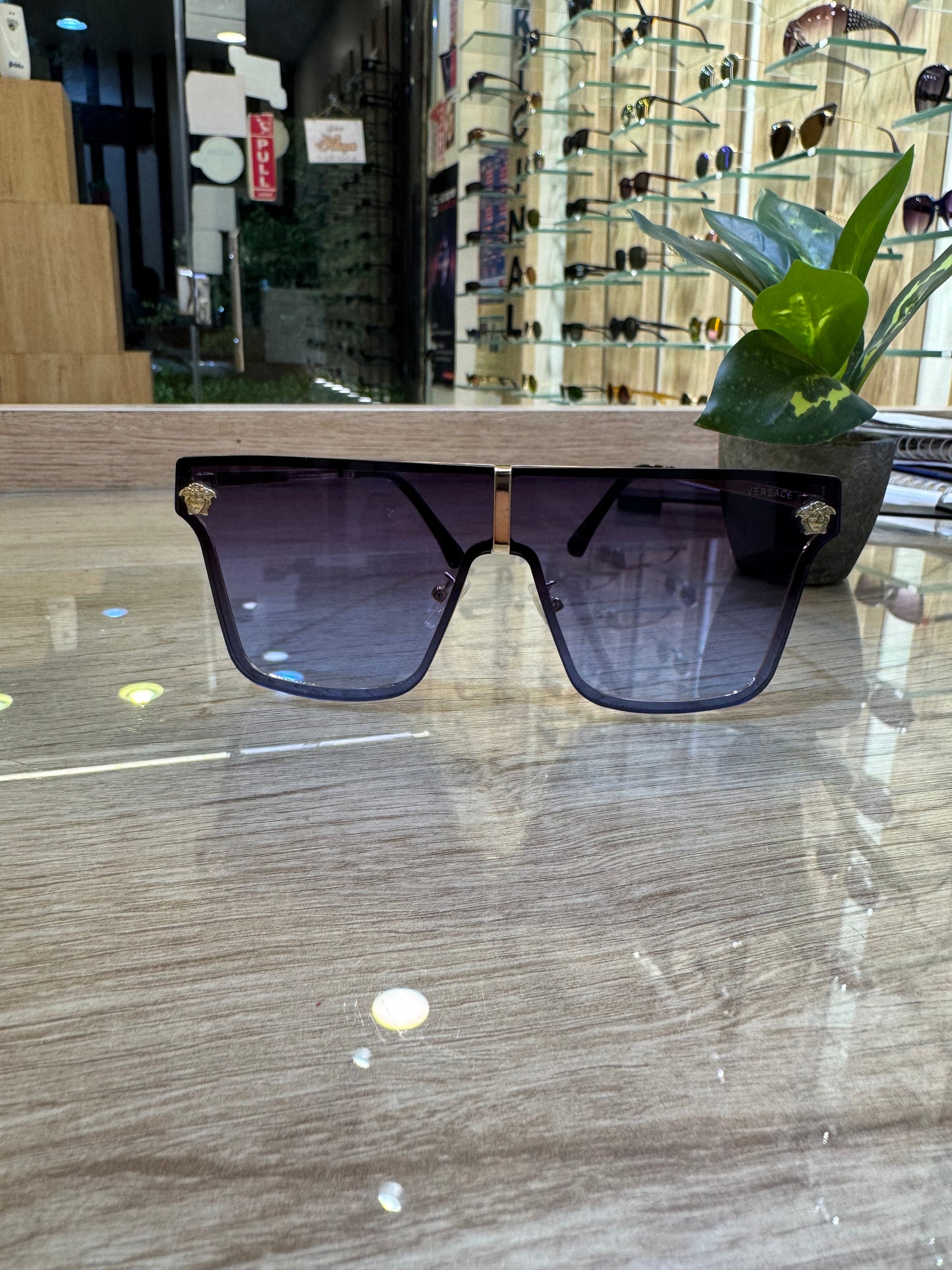 Shield Versace Sunglasses – Black Frame with Gradient Lenses and Medusa Detail